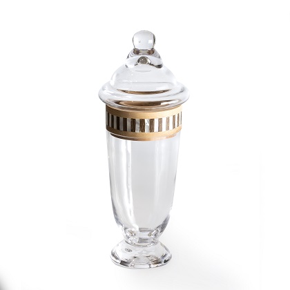 alt="clear glass urn with mother of pearl lid"