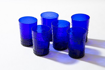 alt="embossed blue juice and water cups"