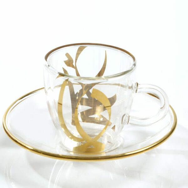 alt="double glass coffee gold caligraphy"