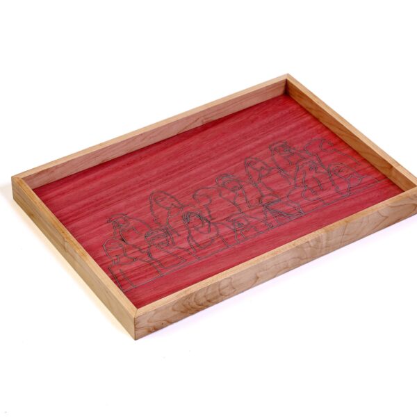Faces and figures wooden tray with red background and blue calligraphy