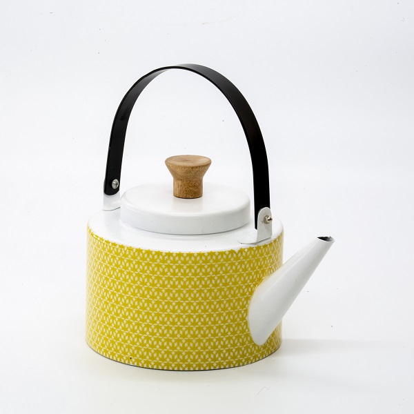 alt="yellow teapot with colorful handle"