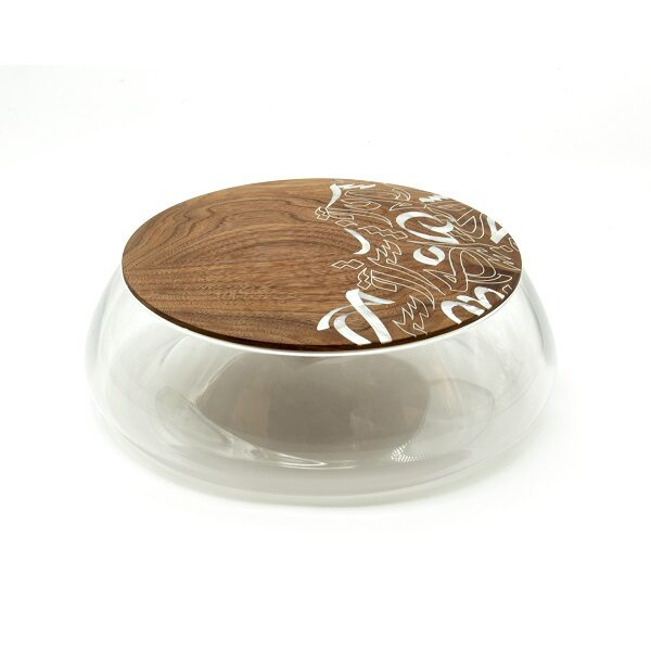 alt="clear bowl with wood and mother of pearl lid with calligraphy"