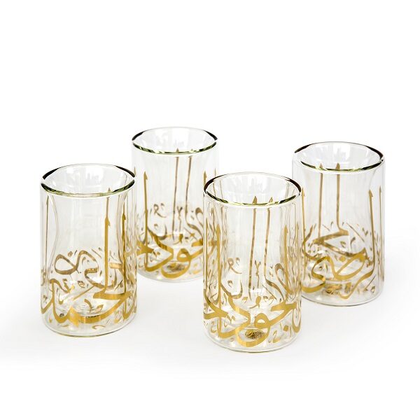 alt="clear double wall tea cups with gold calligraphy"