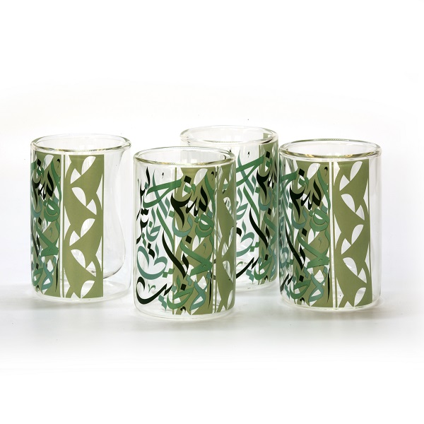 alt="clear double wall tea cups with green calligraphy"