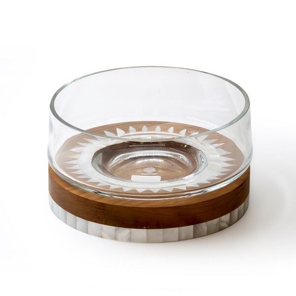 alt="clear glass bowl with wood and mother of pearl base"