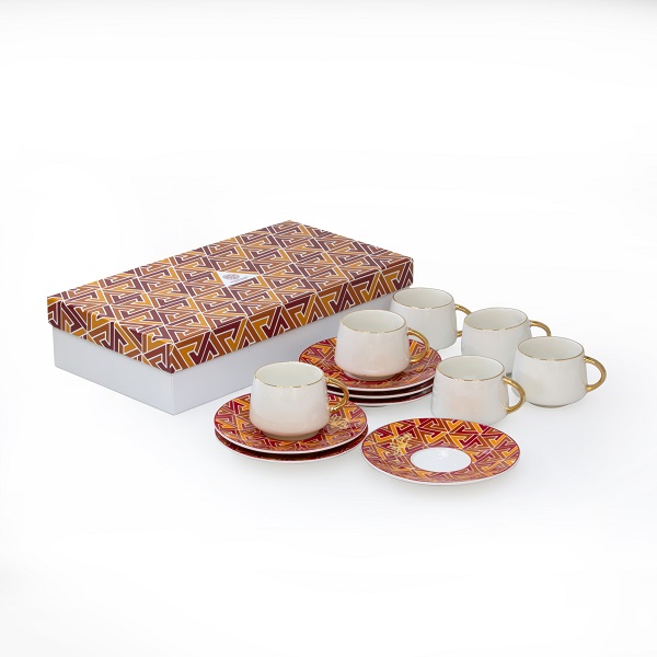 alt="white porcelain turkish coffee cups with colourful design"