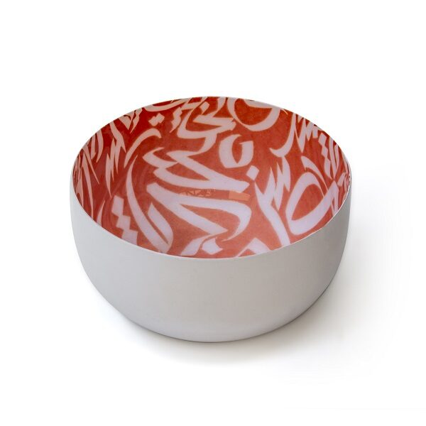 alt="orange iron bowl with calligraphy"