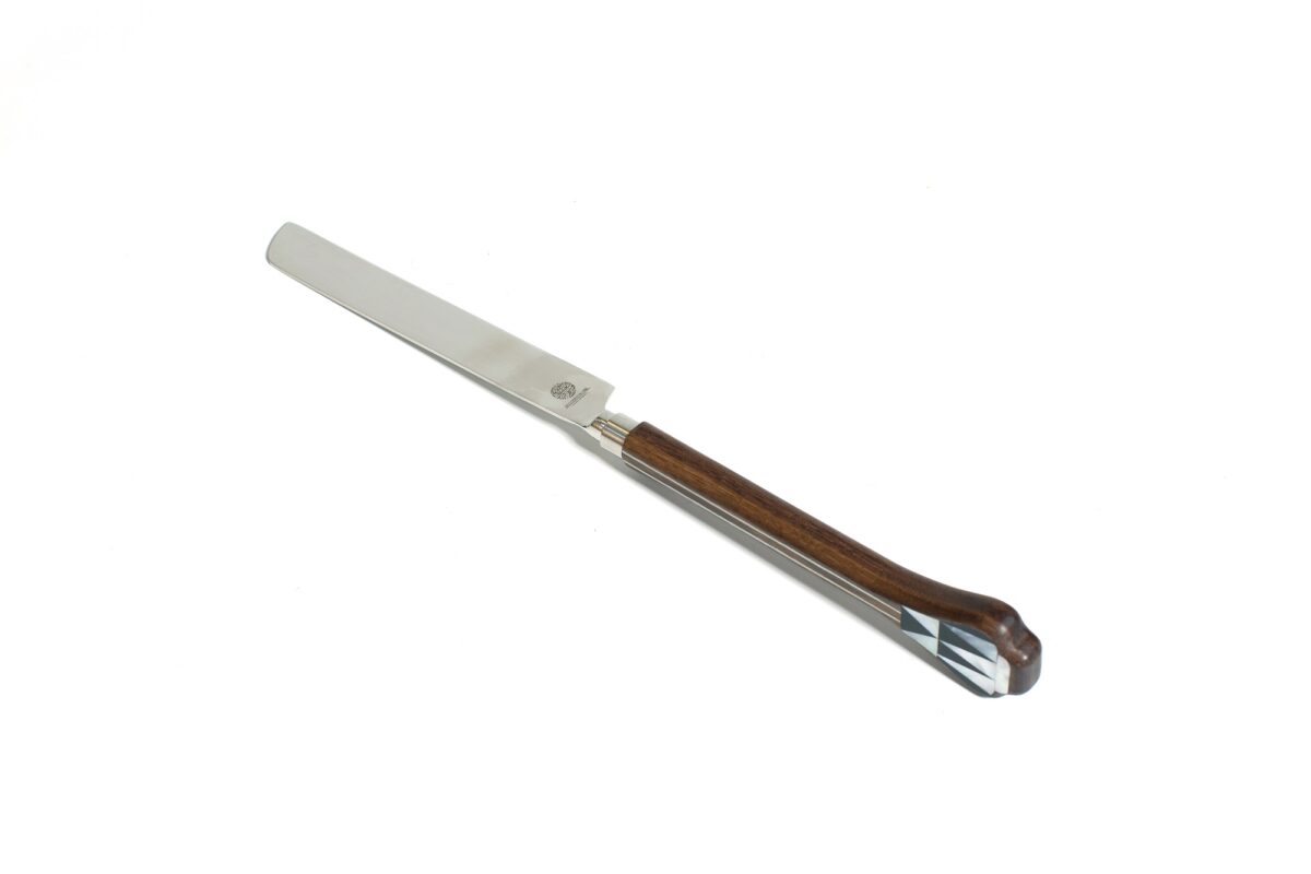 alt="stainless steel cake knife with mop"