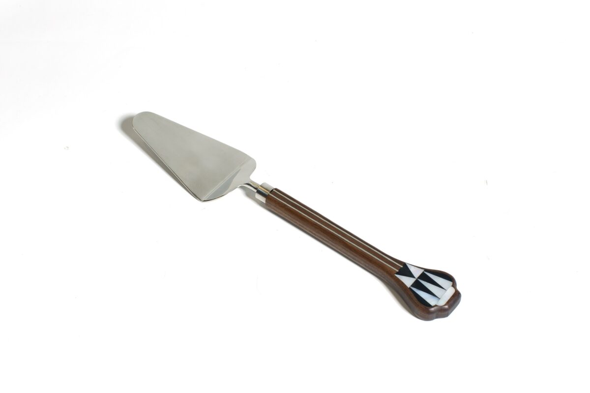 alt="stainless steel cake spatula with mop"