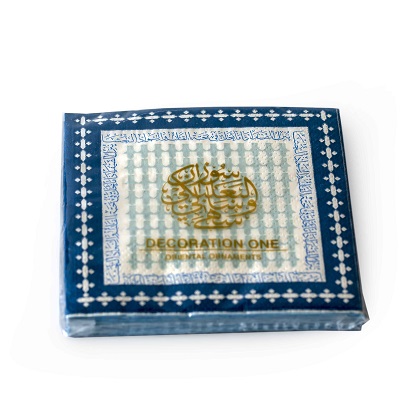 "Printed napkins, with turqouise and navy design and Arabic calligraphy on its border. The verse is written by the poet Al Mutanabi describing how people's true selves is shown in how generous they are. عَلى قَدرِ أَهلِ العَزمِ تَأتي العَزائِمُ
وَتَأتي عَلى قَدرِ الكِرامِ المَكارِم.  Napkin size 21x21cm when open, 2ply tissue, 20 napkins per pack."